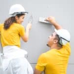 Couple in the house construction concept